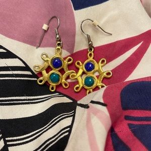 Gold earring with green and blue stone